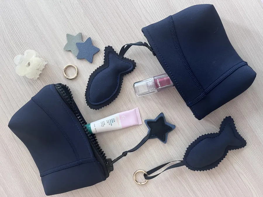 pouches and charms made from retired suits